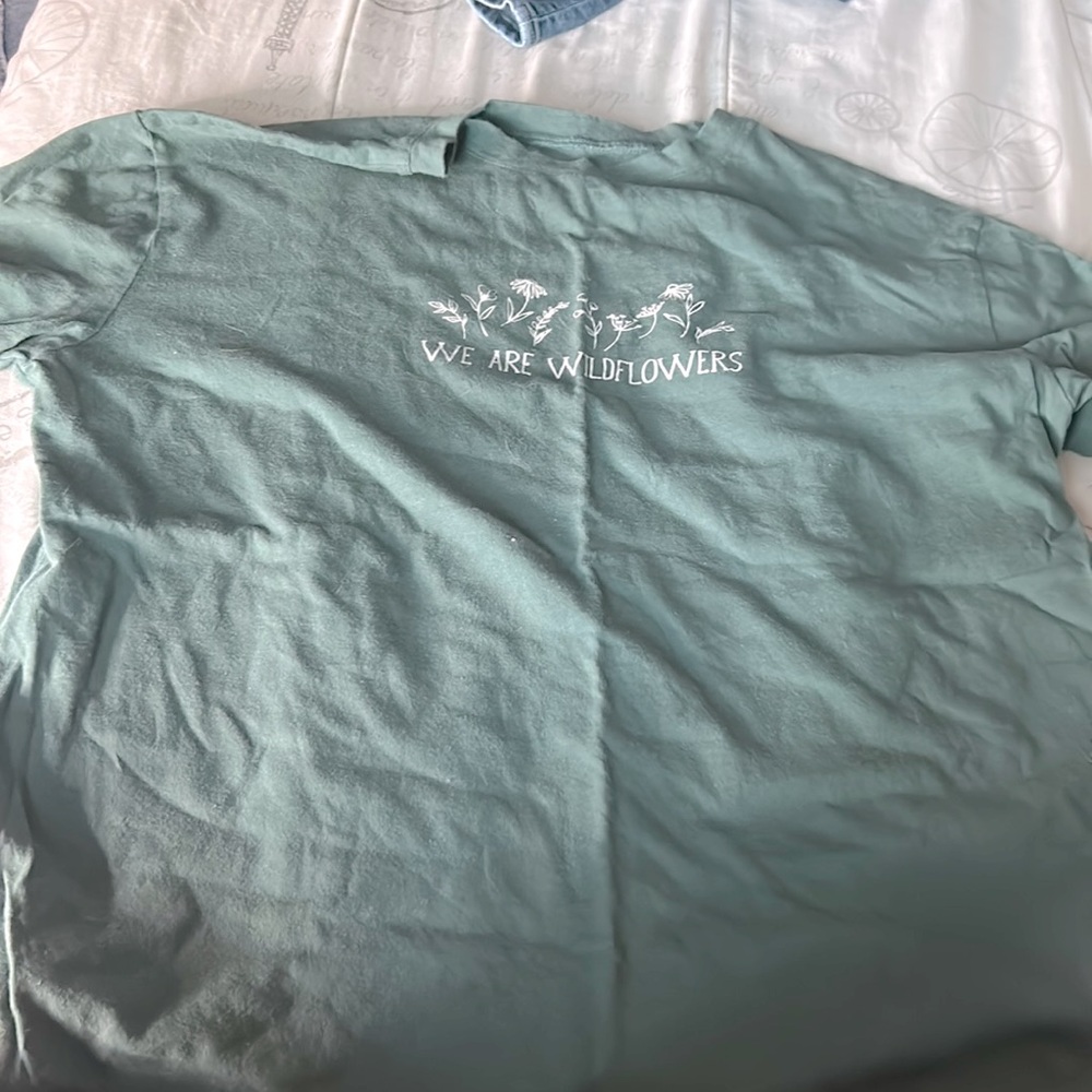 We are wildflowers” shirt